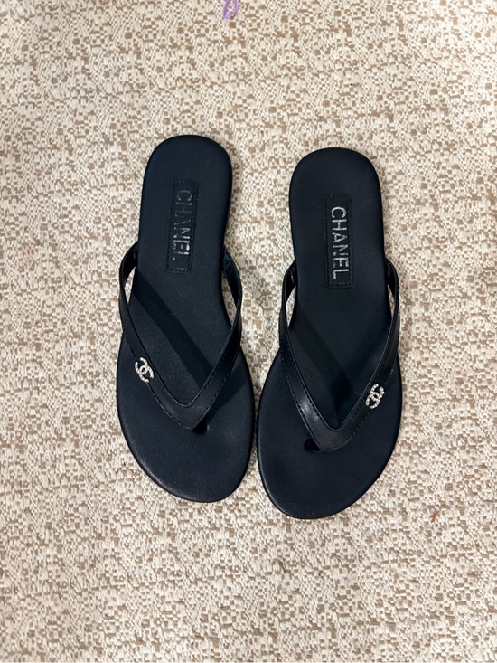 CHANEL Shoes - CHANEL Black Leather Logo Thong Sandals